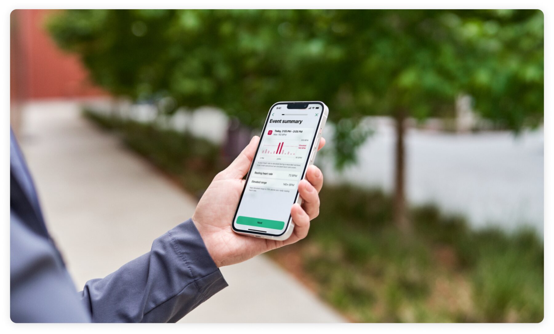 A user reviews an ESNTL elevated heart-rate event summary on iPhone